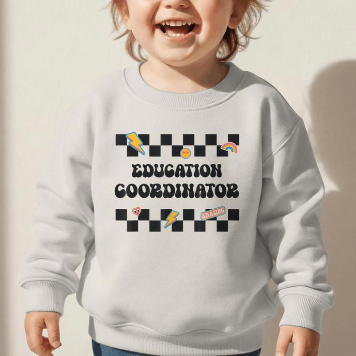 Education Coordinator Groovy Back To School Checkered Graphic Toddler Sweatshirt Education Coordinator Groovy Back To School Checkered Graphic Toddler Sweatshirt