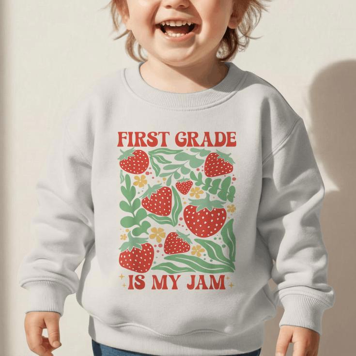 First Grade Is My Jam Boho Floral Strawberry Back To School Graphic Toddler Sweatshirt First Grade Is My Jam Boho Floral Strawberry Back To School Graphic Toddler Sweatshirt