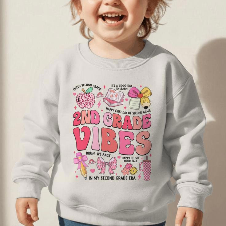 Girls 2nd Grade Vibes Coquette Pink Bow Back To School Graphic Toddler Sweatshirt Girls 2nd Grade Vibes Coquette Pink Bow Back To School Graphic Toddler Sweatshirt