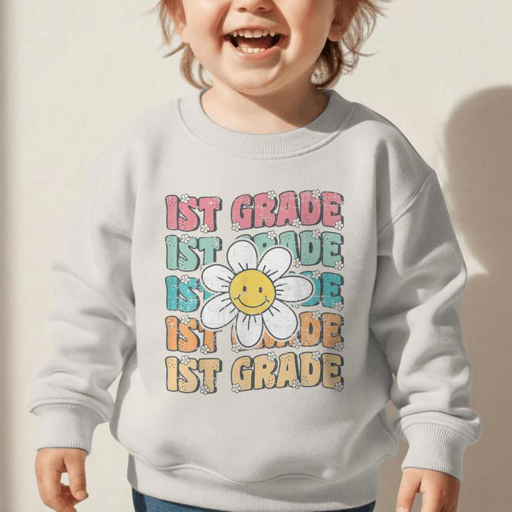Groovy 1st Grade Back To School First Day Of First Grade Graphic Toddler Sweatshirt Groovy 1st Grade Back To School First Day Of First Grade Graphic Toddler Sweatshirt