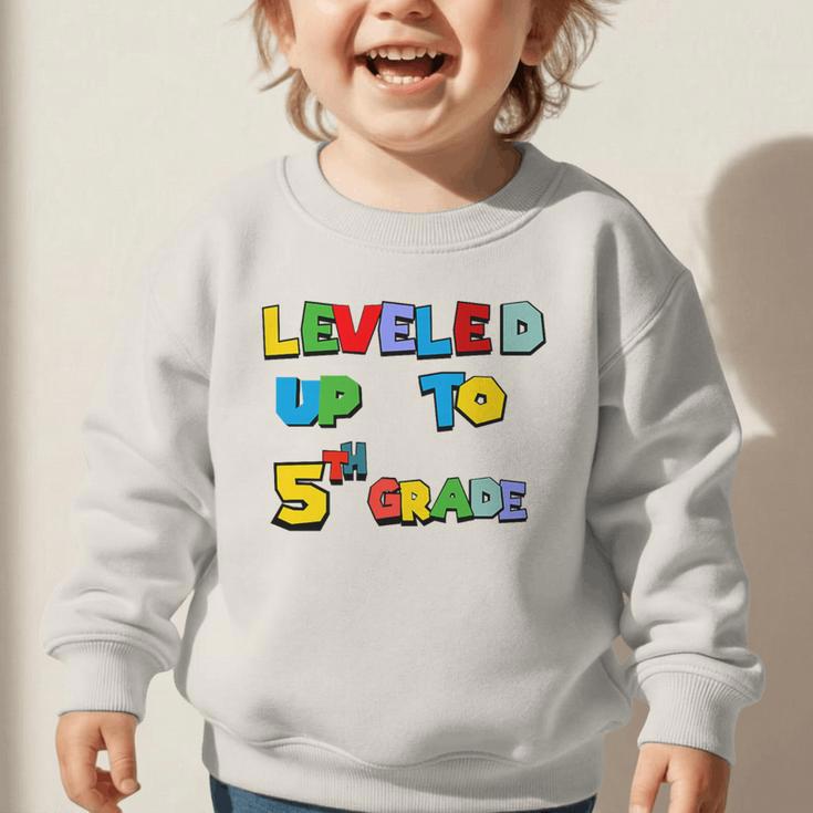 Leveled Up To 5th Grade Back To School Kids Boys Premium Tri-Blend Graphic Toddler Sweatshirt Leveled Up To 5th Grade Back To School Kids Boys Premium Tri-Blend Graphic Toddler Sweatshirt