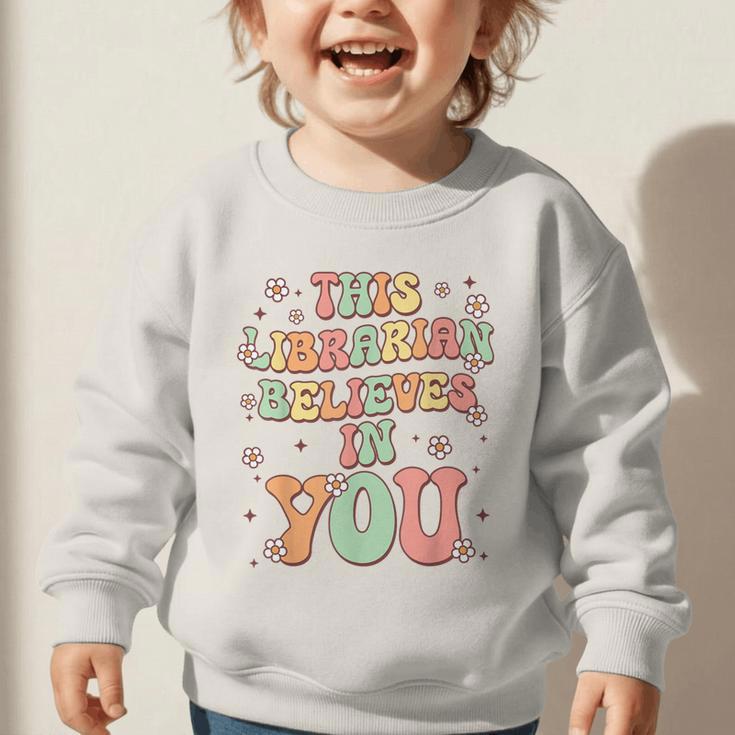This Librarian Believes In You Groovy Back To School Graphic Toddler Sweatshirt
