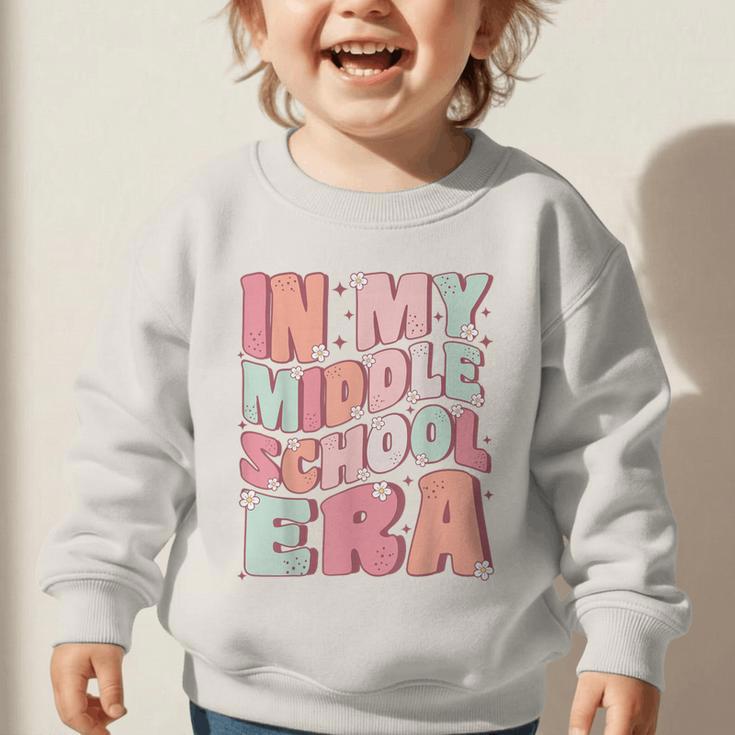 In My Middle School Era Cute Groovy First Day Back To School Graphic Toddler Sweatshirt In My Middle School Era Cute Groovy First Day Back To School Graphic Toddler Sweatshirt