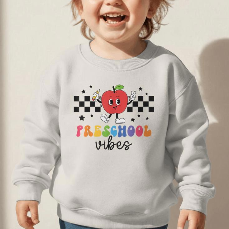 Preschool Vibes Retro Groovy Apple Back To School Graphic Toddler Sweatshirt Preschool Vibes Retro Groovy Apple Back To School Graphic Toddler Sweatshirt