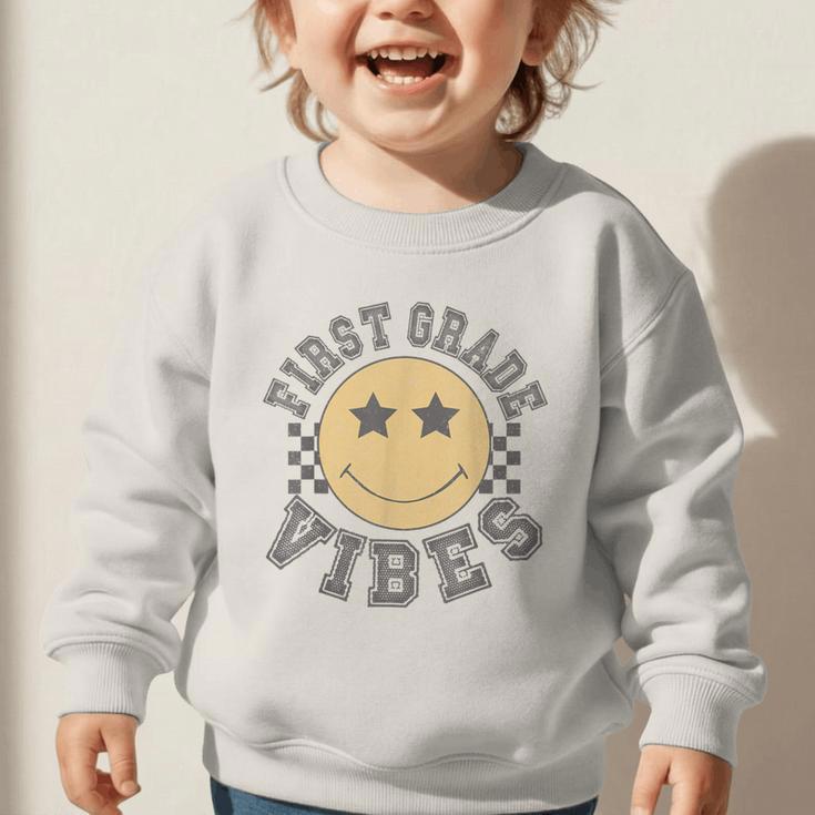 Retro First Grade Vibes Smile Face Back To School 1st Grade Graphic Toddler Sweatshirt