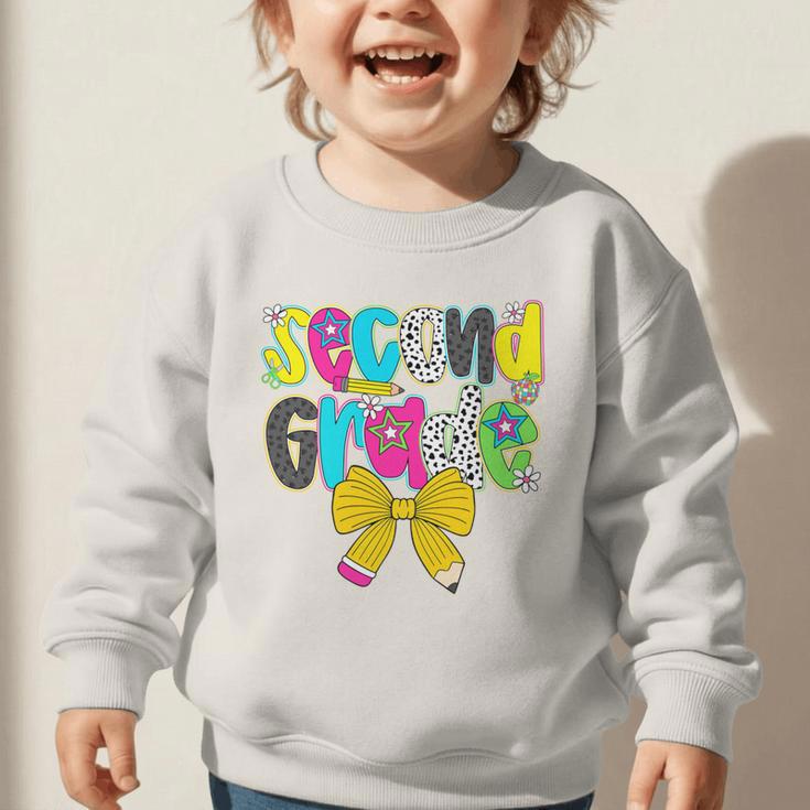 Second Grade Coquette Bow First Day Of School Back To School Performance Graphic Toddler Sweatshirt Second Grade Coquette Bow First Day Of School Back To School Performance Graphic Toddler Sweatshirt