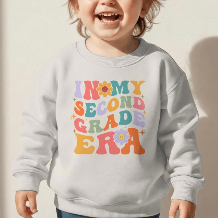 In My Second Grade Era Back To School Retro Groovy 2nd Grade Graphic Toddler Sweatshirt In My Second Grade Era Back To School Retro Groovy 2nd Grade Graphic Toddler Sweatshirt