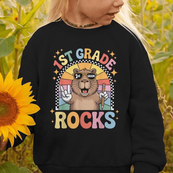 Back To School 1st Grade Capybara First Grade Rocks Graphic Toddler Sweatshirt Back To School 1st Grade Capybara First Grade Rocks Graphic Toddler Sweatshirt