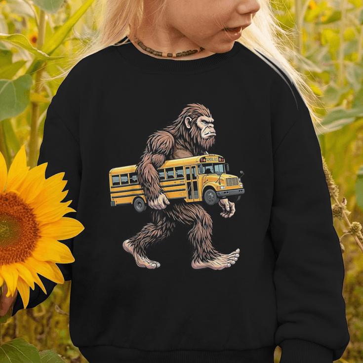 Bigfoot Carrying School Bus Sasquatch Back To School Graphic Toddler Sweatshirt