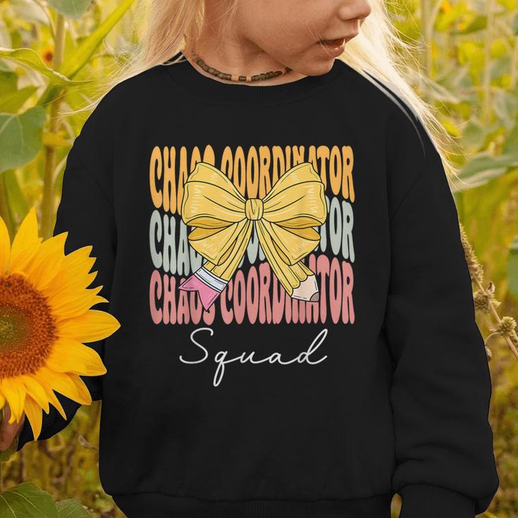 Chaos Coordinator Squad Groovy Coquette Bow Back To School Graphic Toddler Sweatshirt Chaos Coordinator Squad Groovy Coquette Bow Back To School Graphic Toddler Sweatshirt