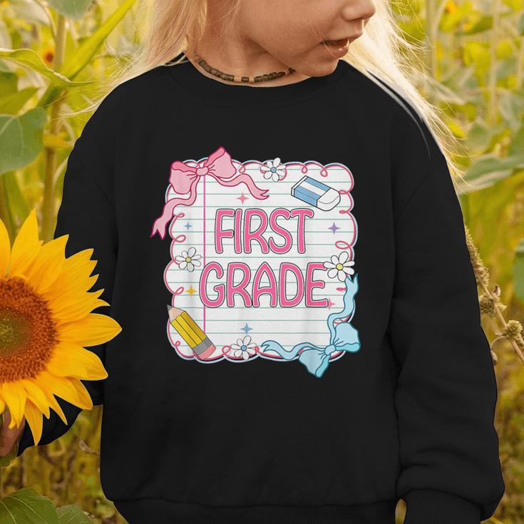 First Grade Back To School Girls Kids Coquette Bows Retro Graphic Toddler Sweatshirt First Grade Back To School Girls Kids Coquette Bows Retro Graphic Toddler Sweatshirt
