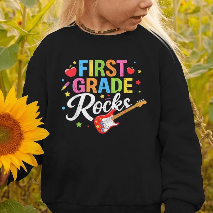 First Grade Rocks Colorful Back To School Guitar Graphic Toddler Sweatshirt First Grade Rocks Colorful Back To School Guitar Graphic Toddler Sweatshirt