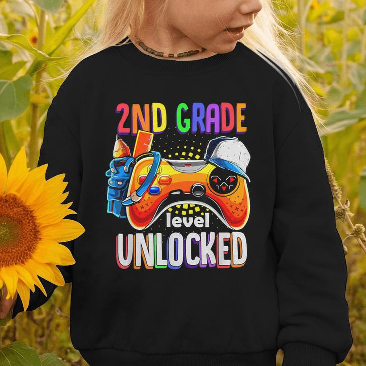 Gamer Back To School Gamepad 2nd Second Grade Level Unlocked Graphic Toddler Sweatshirt Gamer Back To School Gamepad 2nd Second Grade Level Unlocked Graphic Toddler Sweatshirt