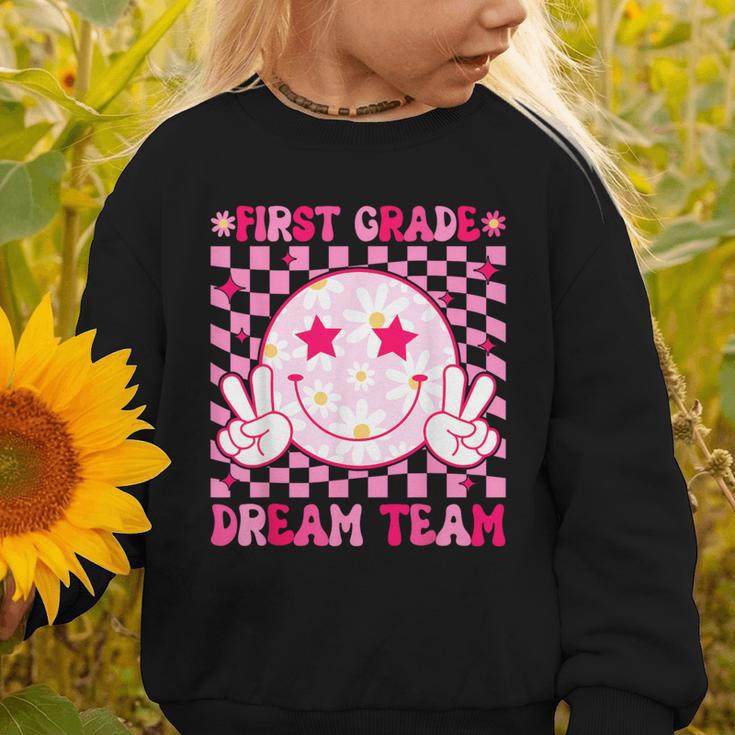 Groovy First Grade Dream Team Back To School 1st Grade Squad Graphic Toddler Sweatshirt