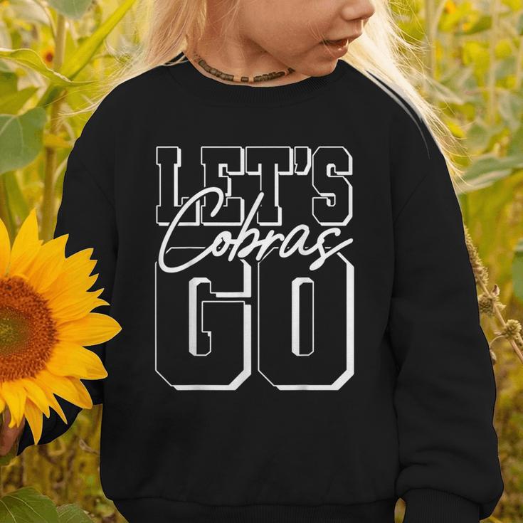 Let's Go Cobras Back To School Spirit Graphic Toddler Sweatshirt Let's Go Cobras Back To School Spirit Graphic Toddler Sweatshirt