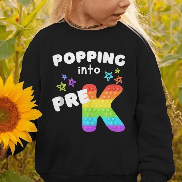 Popping Into Pre K Kid's Back To School Pop It Fidget Toy Graphic Toddler Sweatshirt Popping Into Pre K Kid's Back To School Pop It Fidget Toy Graphic Toddler Sweatshirt