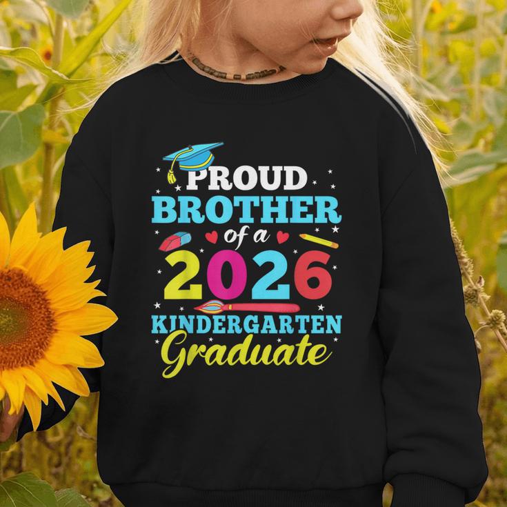 Proud Brother Of 2026 Kindergarten Graduate Back To School Graphic Toddler Sweatshirt Proud Brother Of 2026 Kindergarten Graduate Back To School Graphic Toddler Sweatshirt