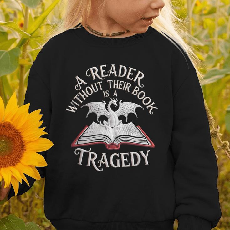 A Reader Without Their Book Is a Tragedy Back To School Graphic Toddler Sweatshirt A Reader Without Their Book Is a Tragedy Back To School Graphic Toddler Sweatshirt