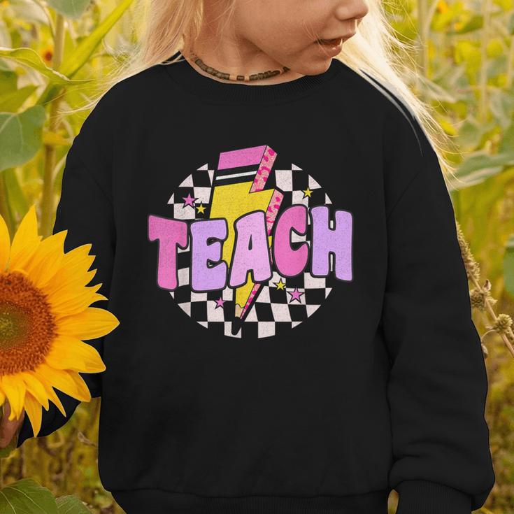 Retro Checkered Teach Pencil Lightning Back To School Graphic Toddler Sweatshirt Retro Checkered Teach Pencil Lightning Back To School Graphic Toddler Sweatshirt