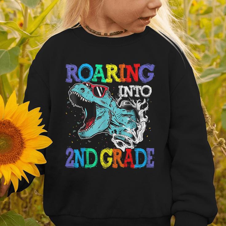 Roaring Into 2Nd Grade DinosaurRex Back To School Graphic Toddler Sweatshirt Roaring Into 2Nd Grade DinosaurRex Back To School Graphic Toddler Sweatshirt
