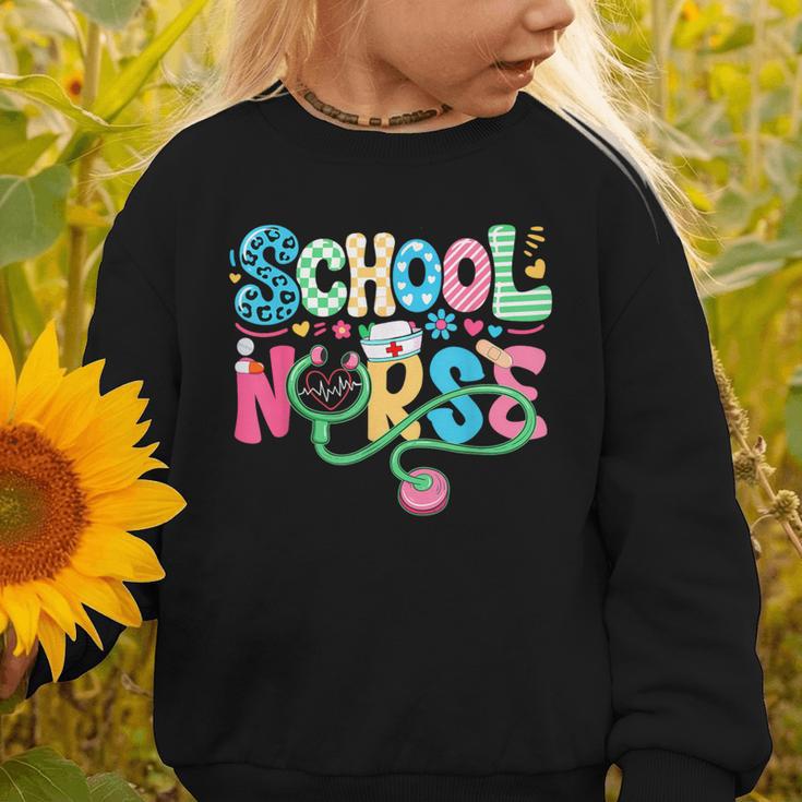 School Nurse Colorful Costume Back To School Nursing Job Graphic Toddler Sweatshirt School Nurse Colorful Costume Back To School Nursing Job Graphic Toddler Sweatshirt