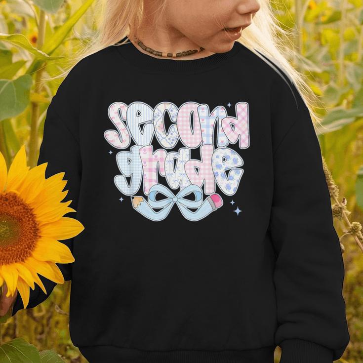 Second Grade Coquette Bow First Day Of School Back To School Graphic Toddler Sweatshirt Second Grade Coquette Bow First Day Of School Back To School Graphic Toddler Sweatshirt