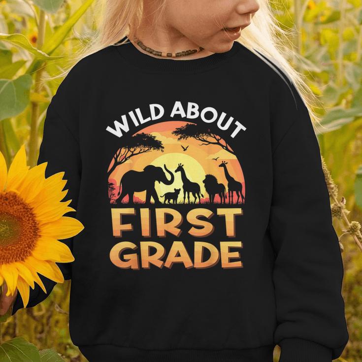 Wild About First Grade Zoo Animals Back To School Safari Graphic Toddler Sweatshirt Wild About First Grade Zoo Animals Back To School Safari Graphic Toddler Sweatshirt