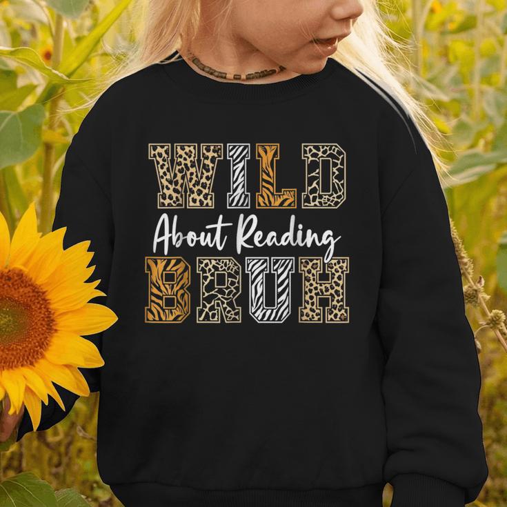 Wild About Reading Kid Love Wild Animal Books Back To School Graphic Toddler Sweatshirt Wild About Reading Kid Love Wild Animal Books Back To School Graphic Toddler Sweatshirt