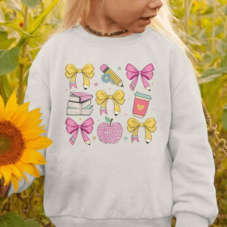 Apple Coquette Bow Books First Day Of School Back To School Graphic Toddler Sweatshirt Apple Coquette Bow Books First Day Of School Back To School Graphic Toddler Sweatshirt