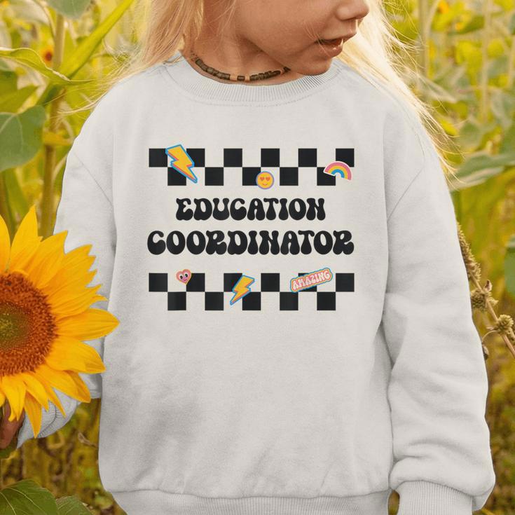 Education Coordinator Groovy Back To School Checkered Graphic Toddler Sweatshirt Education Coordinator Groovy Back To School Checkered Graphic Toddler Sweatshirt