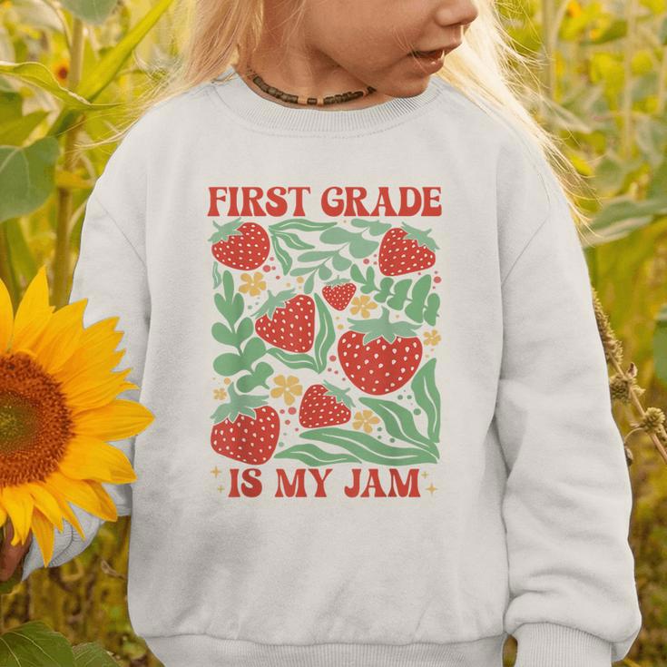 First Grade Is My Jam Boho Floral Strawberry Back To School Graphic Toddler Sweatshirt First Grade Is My Jam Boho Floral Strawberry Back To School Graphic Toddler Sweatshirt