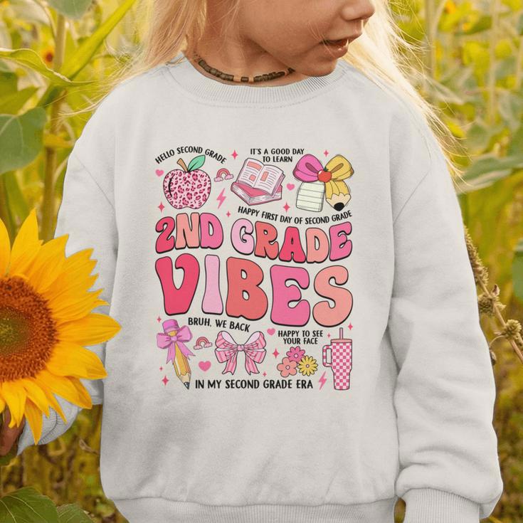 Girls 2nd Grade Vibes Coquette Pink Bow Back To School Graphic Toddler Sweatshirt Girls 2nd Grade Vibes Coquette Pink Bow Back To School Graphic Toddler Sweatshirt