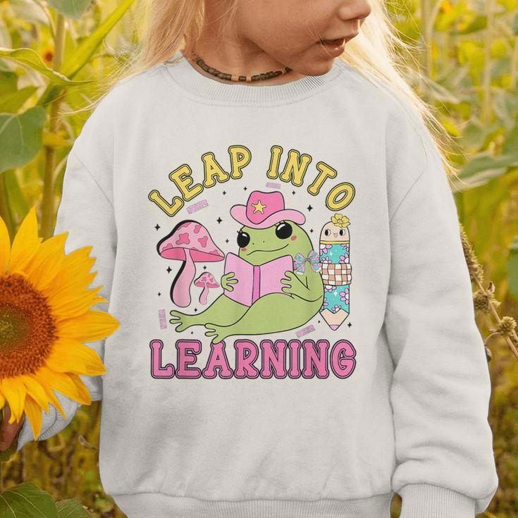 Leap Into Learning Cute Frog Kawaii Back To School Kids Graphic Toddler Sweatshirt Leap Into Learning Cute Frog Kawaii Back To School Kids Graphic Toddler Sweatshirt