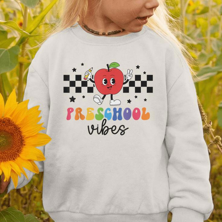 Preschool Vibes Retro Groovy Apple Back To School Graphic Toddler Sweatshirt Preschool Vibes Retro Groovy Apple Back To School Graphic Toddler Sweatshirt