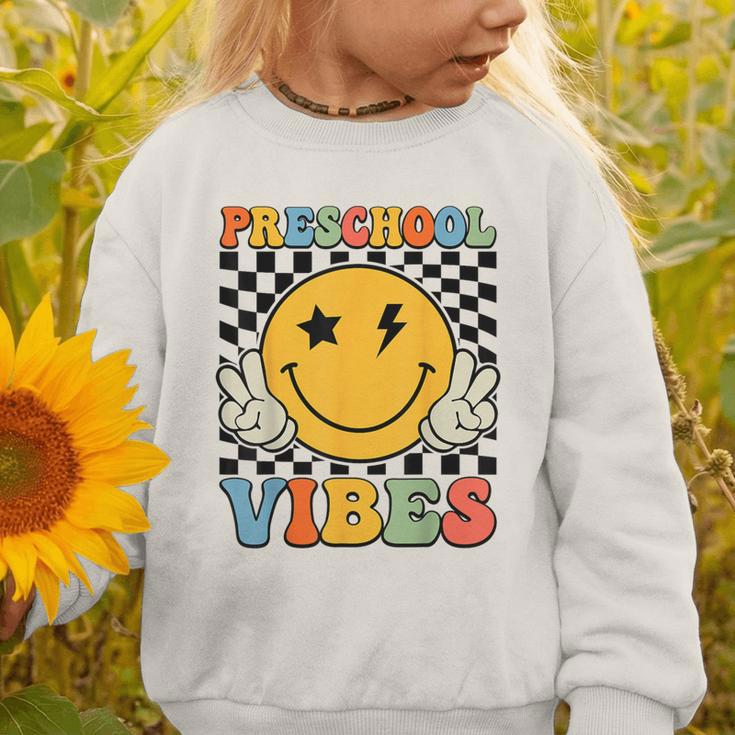 Preschool Vibes Retro Groovy Back To School Pre-K Graphic Toddler Sweatshirt Preschool Vibes Retro Groovy Back To School Pre-K Graphic Toddler Sweatshirt