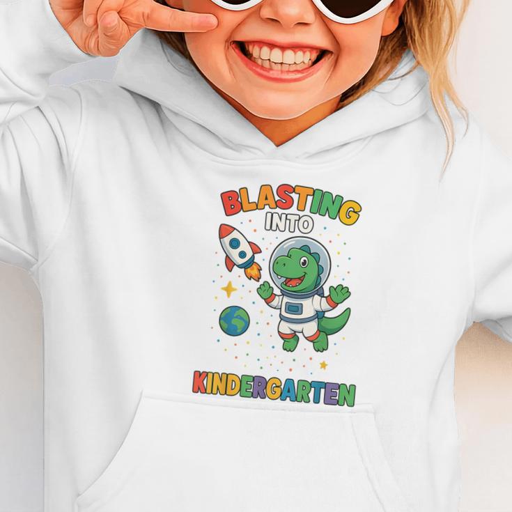 Blasting Into Kindergarten Dinosaur Astronaut Back To School Graphic Toddler Hoodie Blasting Into Kindergarten Dinosaur Astronaut Back To School Graphic Toddler Hoodie