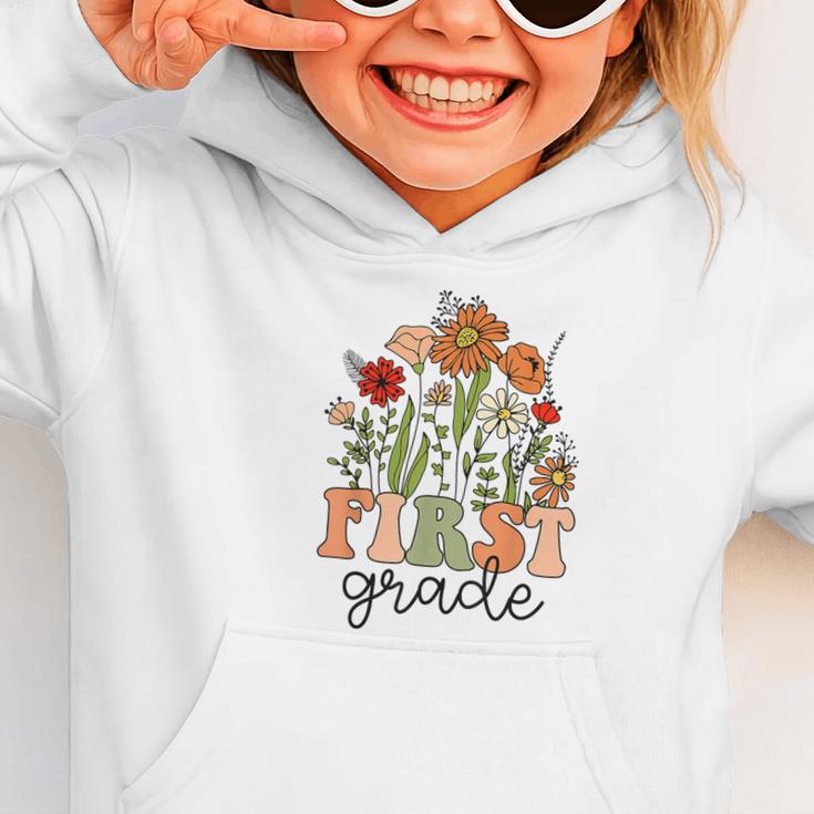 Groovy First Grade Wildflowers Back To School 1st Grade Graphic Toddler Hoodie Groovy First Grade Wildflowers Back To School 1st Grade Graphic Toddler Hoodie