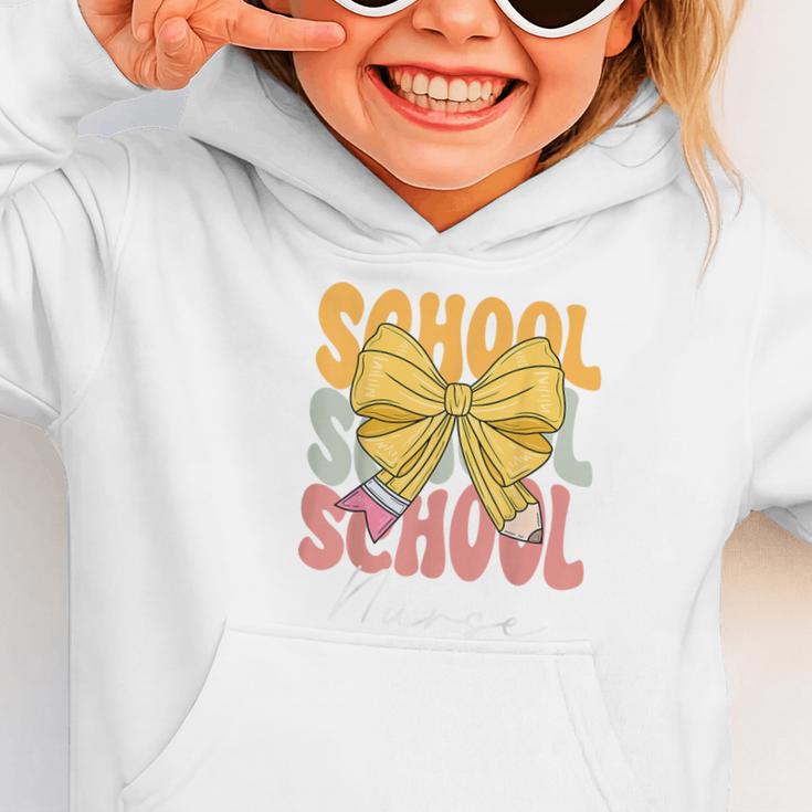School Nurse Groovy Coquette Bow Cute Back To School Graphic Toddler Hoodie School Nurse Groovy Coquette Bow Cute Back To School Graphic Toddler Hoodie