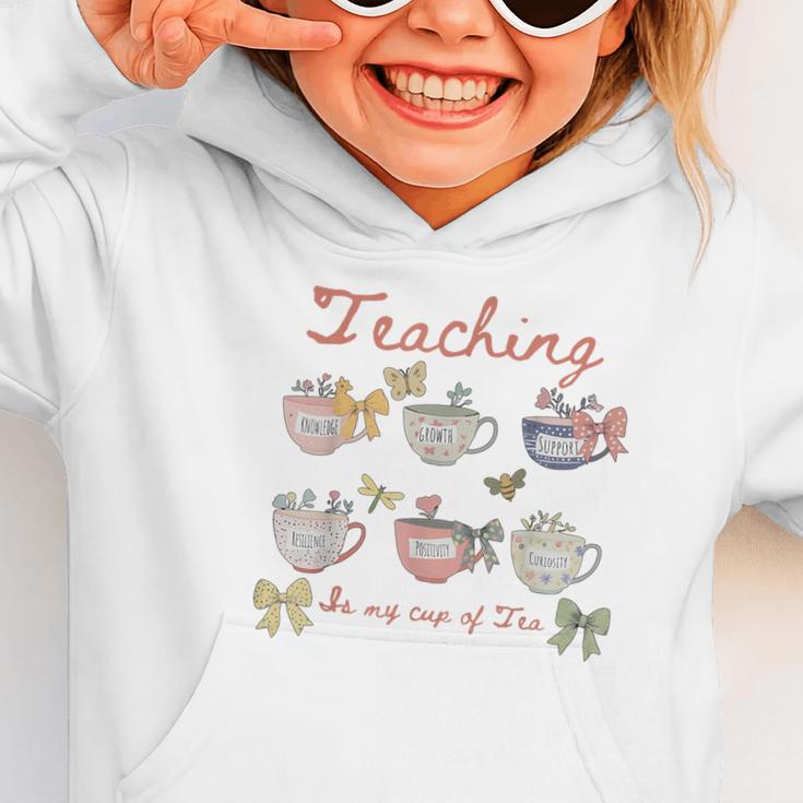Teaching Is My Cup Of Tea Coquette Bow Floral Back To School Graphic Toddler Hoodie Teaching Is My Cup Of Tea Coquette Bow Floral Back To School Graphic Toddler Hoodie
