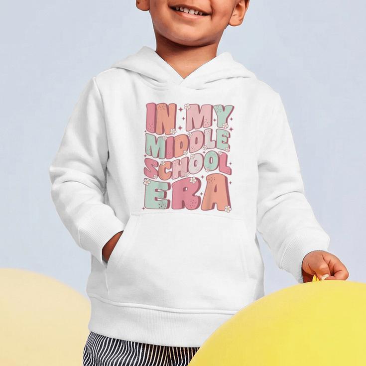 In My Middle School Era Cute Groovy First Day Back To School Graphic Toddler Hoodie In My Middle School Era Cute Groovy First Day Back To School Graphic Toddler Hoodie