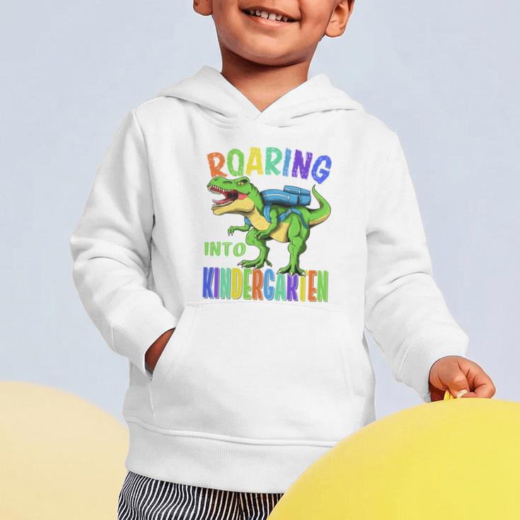 Roaring Into Kindergarten DinosaurRex Back To School Boys Performance Graphic Toddler Hoodie Roaring Into Kindergarten DinosaurRex Back To School Boys Performance Graphic Toddler Hoodie