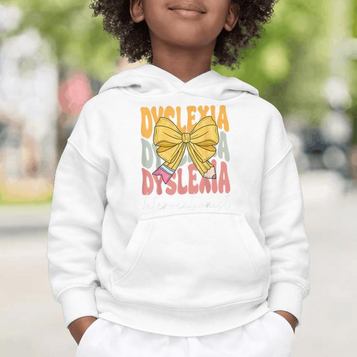 Dyslexia Interventionist Groovy Coquette Bow Back To School Graphic Toddler Hoodie Dyslexia Interventionist Groovy Coquette Bow Back To School Graphic Toddler Hoodie