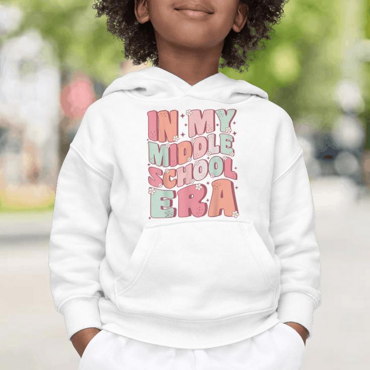 In My Middle School Era Cute Groovy First Day Back To School Graphic Toddler Hoodie In My Middle School Era Cute Groovy First Day Back To School Graphic Toddler Hoodie