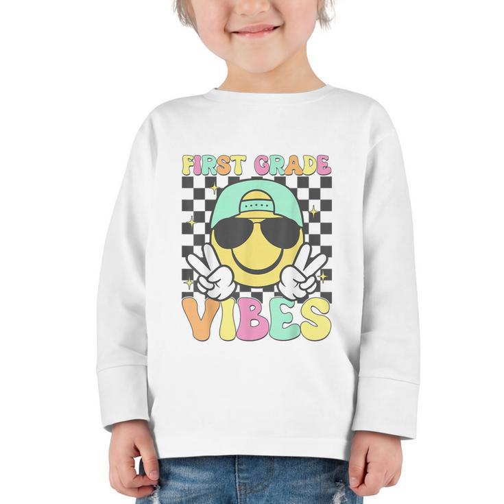 1st Grade Vibes Smile Face Back To School First Grade Graphic Toddler Long Sleeve Tee