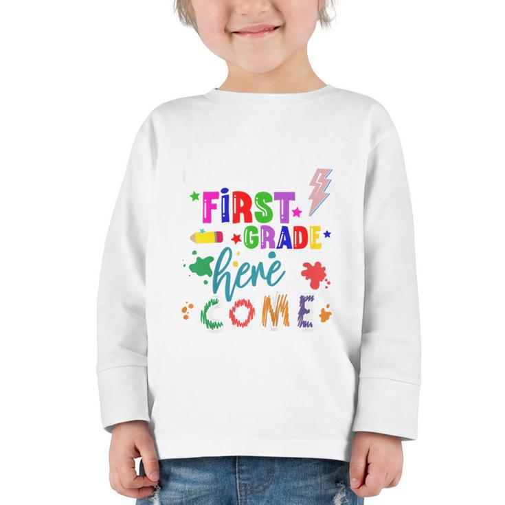 Kids Watch Out First Grade Here I Come 1st Grade Back To School Graphic Toddler Long Sleeve Tee