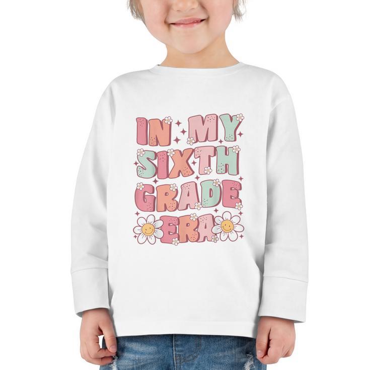 In My Sixth Grade Era Cute Groovy 6th Grade Back To School Graphic Toddler Long Sleeve Tee