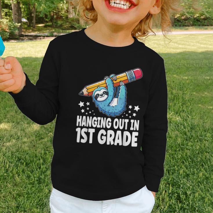 Back To School First Grade Sloth Hanging Out In 1st Grade Graphic Toddler Long Sleeve Tee Back To School First Grade Sloth Hanging Out In 1st Grade Graphic Toddler Long Sleeve Tee