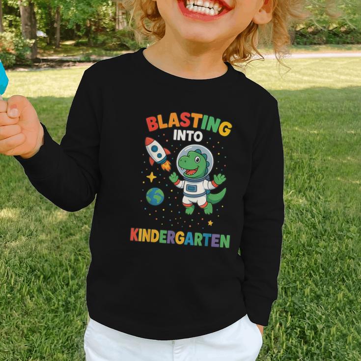 Blasting Into Kindergarten Dinosaur Astronaut Back To School Graphic Toddler Long Sleeve Tee Blasting Into Kindergarten Dinosaur Astronaut Back To School Graphic Toddler Long Sleeve Tee