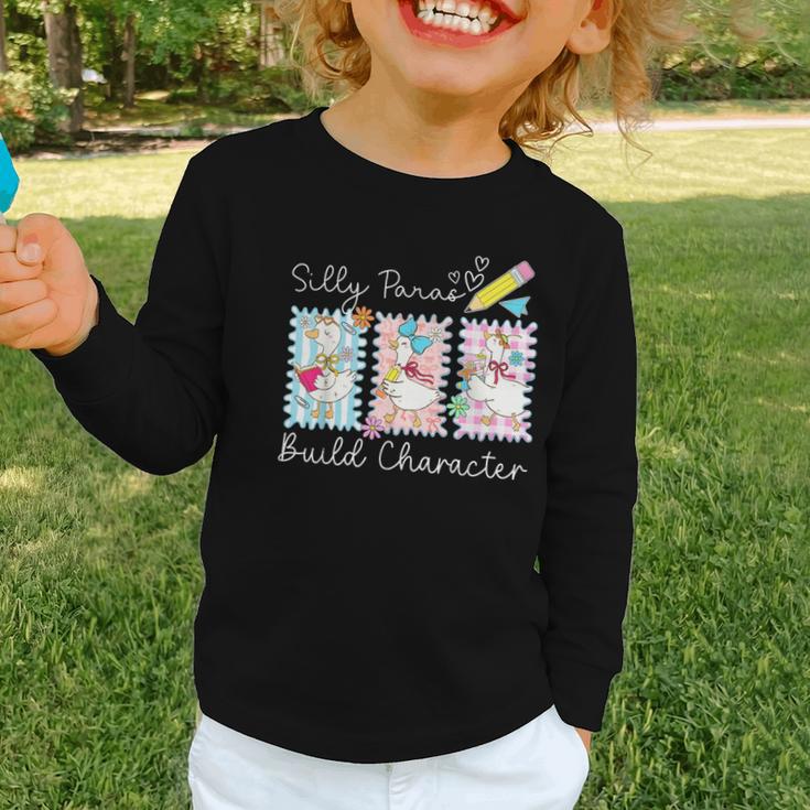 Coquette Back To School Silly Paras Build Character Graphic Toddler Long Sleeve Tee