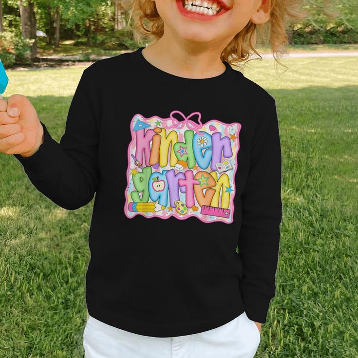 Kindergarten Coquette Bow Back To School Kinder Girl Kids Graphic Toddler Long Sleeve Tee Kindergarten Coquette Bow Back To School Kinder Girl Kids Graphic Toddler Long Sleeve Tee